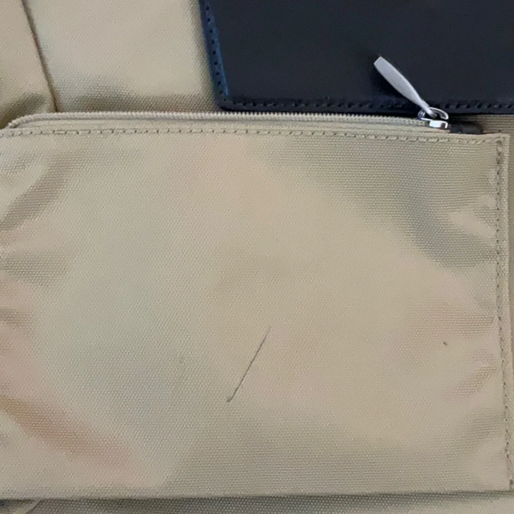 Tumi Tan and Black Briefcase with Durable Design